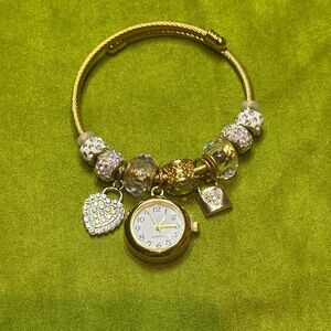 Gold plated Charm Bracelet with Watch
Code #001